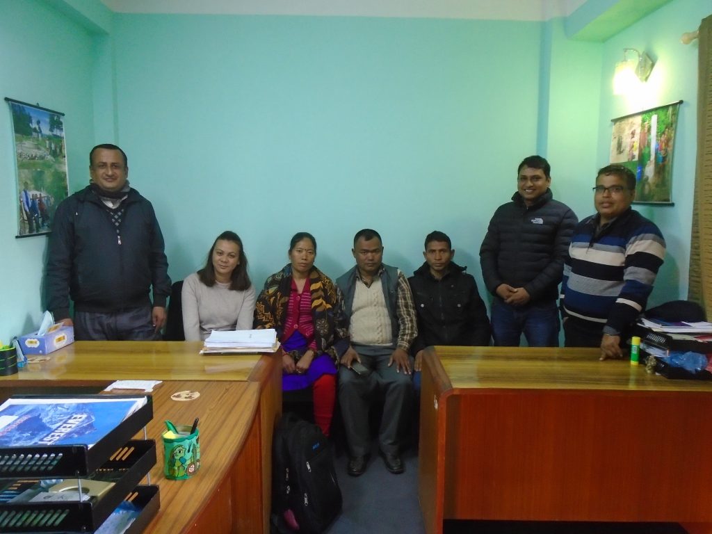 Renewable World project staff and community members from Jugedhara at the technical contractor's office 