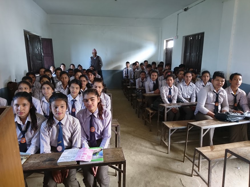 Secondary school students sitting in a classroom